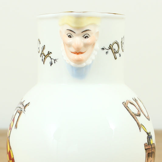 A Coalport Punch Publications porcelain jug, transfer printed decoration with an illustration of Mr.Punch