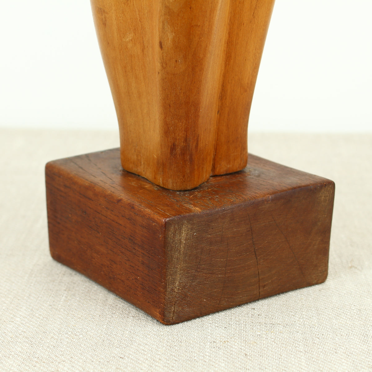 Jean W Cubrie (French) - a wooden sculpture, Cygne Mysterieux (Mysterious Swan), inscribed to base, 42cm high overall