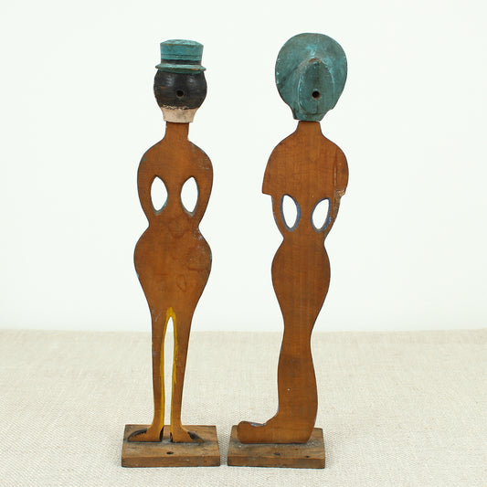 Treen, Folk Art - a pair of early 20th century painted wooden figures, of a well dressed gentleman and lady
