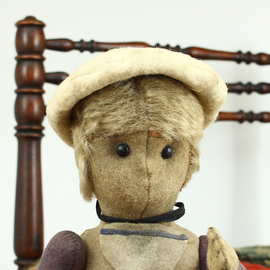 Toys & Juvenalia - an early 20th century straw-filled felt and mohair sailor doll, in the Steiff style