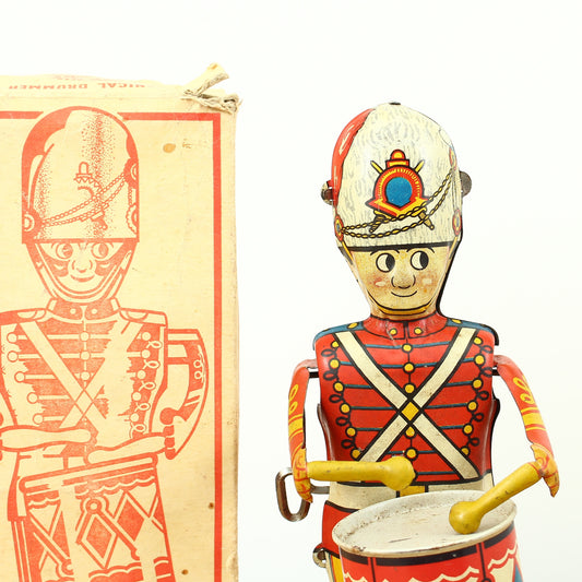 Toys & Juvenalia - a 1940's Louis Marx & Co. Ltd., Swansea, tinplate and clockwork mechanical drummer boy toy, boxed