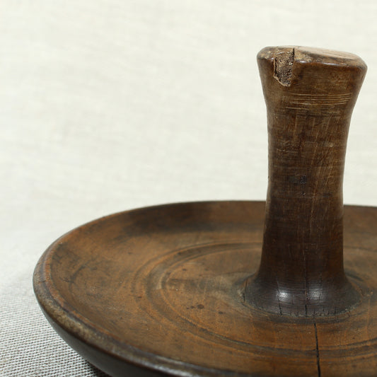 Treen - a pole lathe turned sycamore wood butter worker