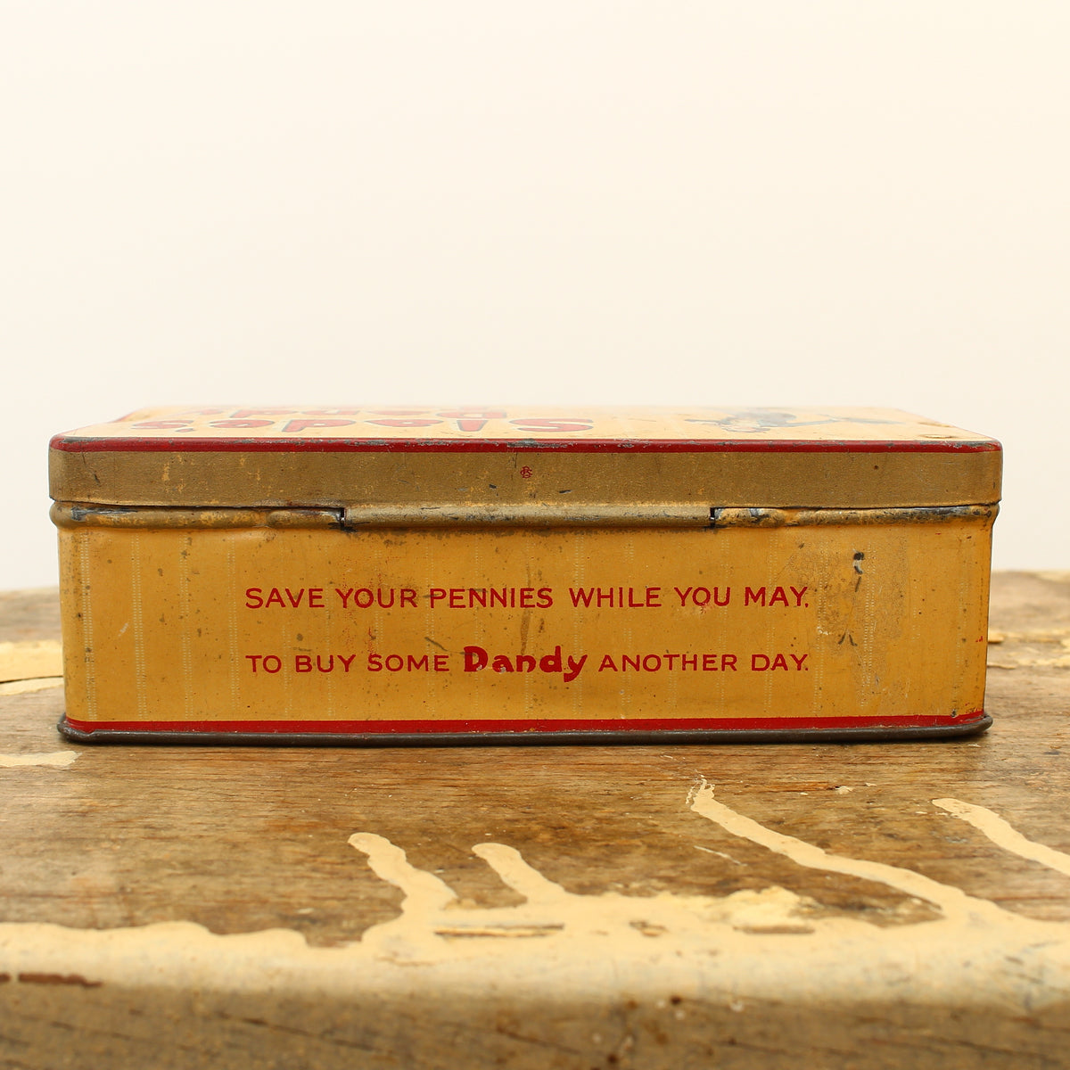 Advertising - a Slade & Bullock Ltd rounded rectangular shaped pictorial advertising tin