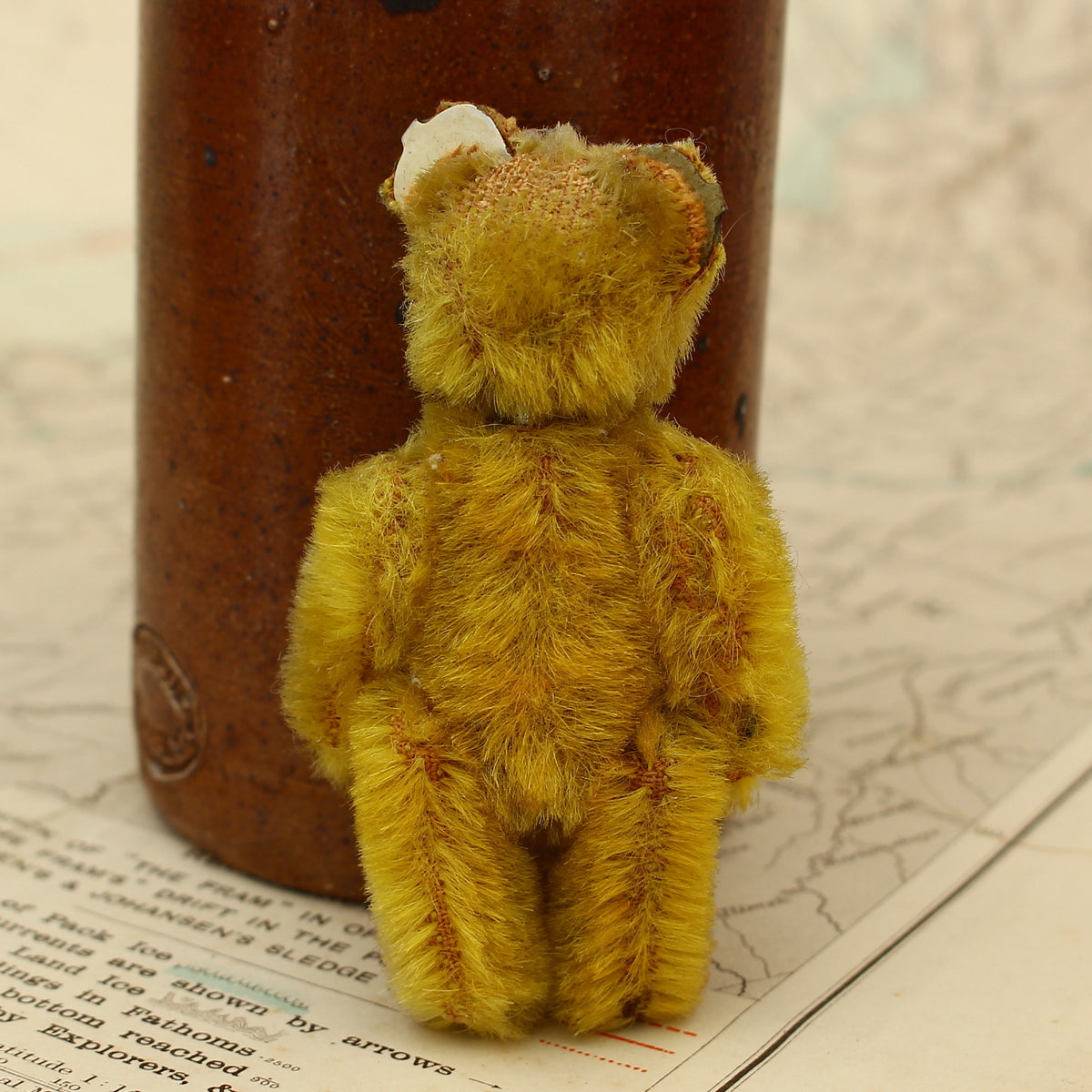 Toys & Juvenalia - a Schuco (Germany) miniature golden mohair jointed teddy bear, c.1930