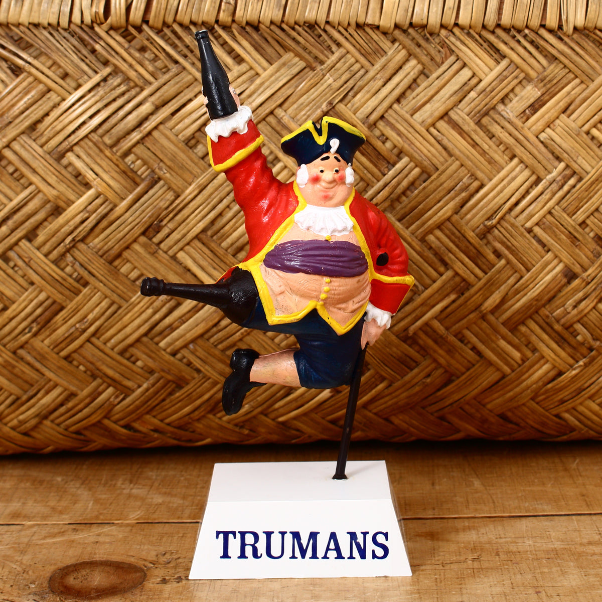 Advertising, Breweriana - a Trumans 'rubberoid' type point of sale advertising figure, depicting a jumping pirate or sailor with a peg leg holding a bottle, 18.6cm high