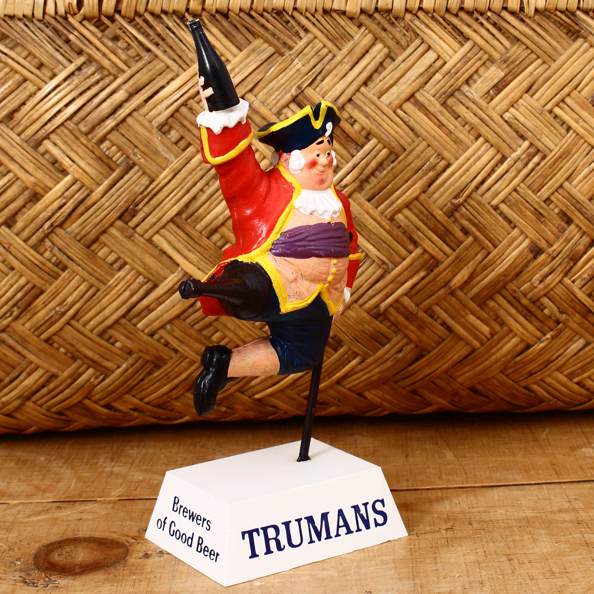 Advertising, Breweriana - a Trumans 'rubberoid' type point of sale advertising figure, depicting a jumping pirate or sailor with a peg leg holding a bottle, 18.6cm high