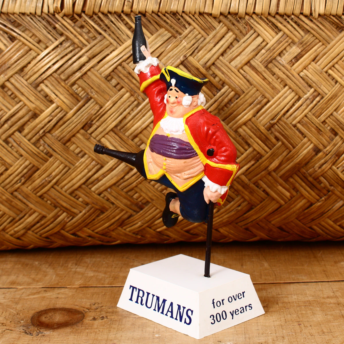 Advertising, Breweriana - a Trumans 'rubberoid' type point of sale advertising figure, depicting a jumping pirate or sailor with a peg leg holding a bottle, 18.6cm high