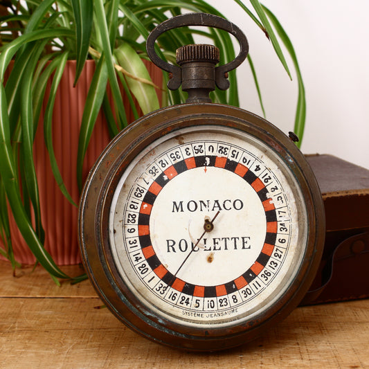 A Systeme Jeansaume Monaco Roulette wheel mechanical novelty, in the style of an oversized pocket watch