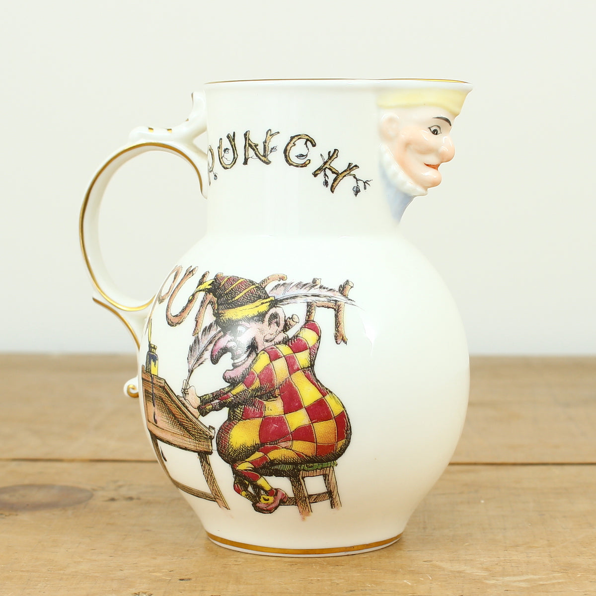 A Coalport Punch Publications porcelain jug, transfer printed decoration with an illustration of Mr.Punch