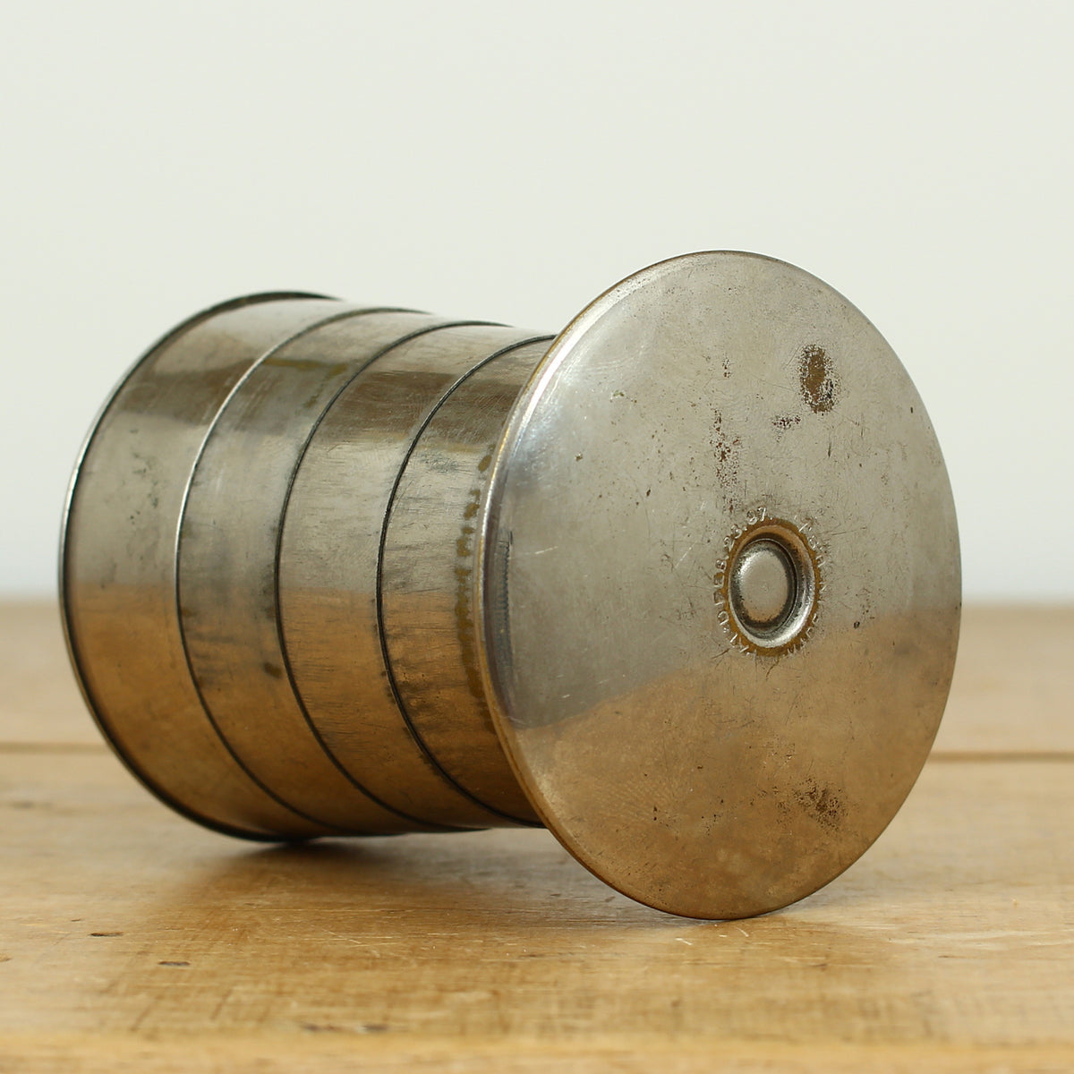 Cycling Interest - a silver coloured metal collapsible travel cup, embossed lid, 'Cyclist's Cup'