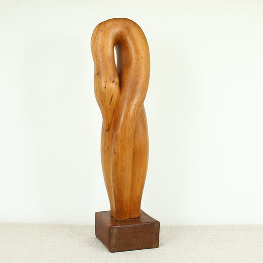 Jean W Cubrie (French)  - a wooden sculpture, Cygne Mysterieux (Mysterious Swan), inscribed to base, 42cm high overall