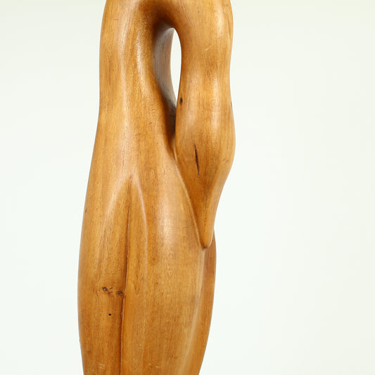 Jean W Cubrie (French)  - a wooden sculpture, Cygne Mysterieux (Mysterious Swan), inscribed to base, 42cm high overall