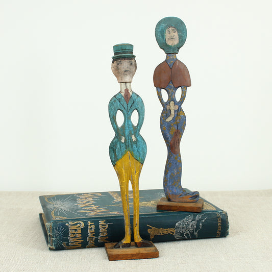Treen, Folk Art - a pair of early 20th century painted wooden figures, of a well dressed gentleman and lady
