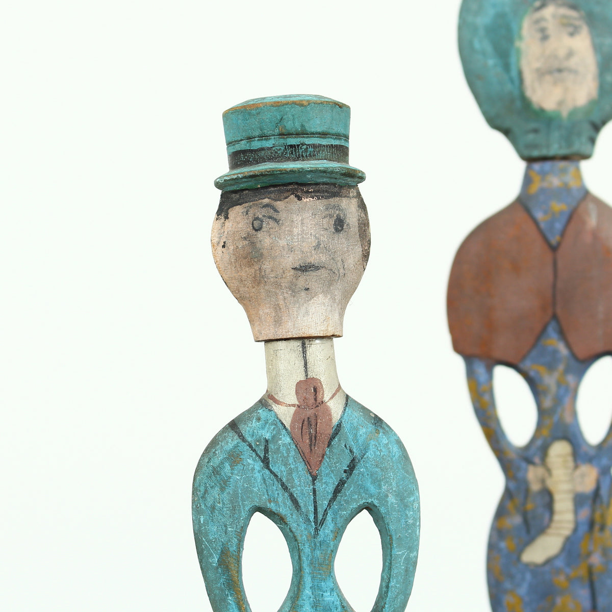 Treen, Folk Art - a pair of early 20th century painted wooden figures, of a well dressed gentleman and lady