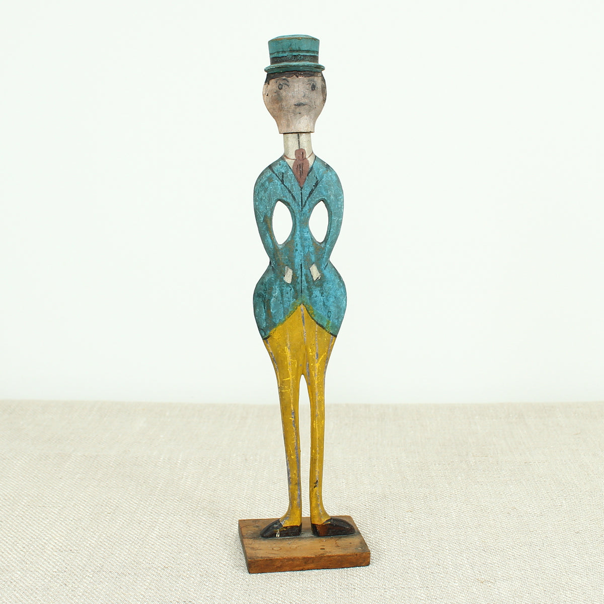Treen, Folk Art - a pair of early 20th century painted wooden figures, of a well dressed gentleman and lady