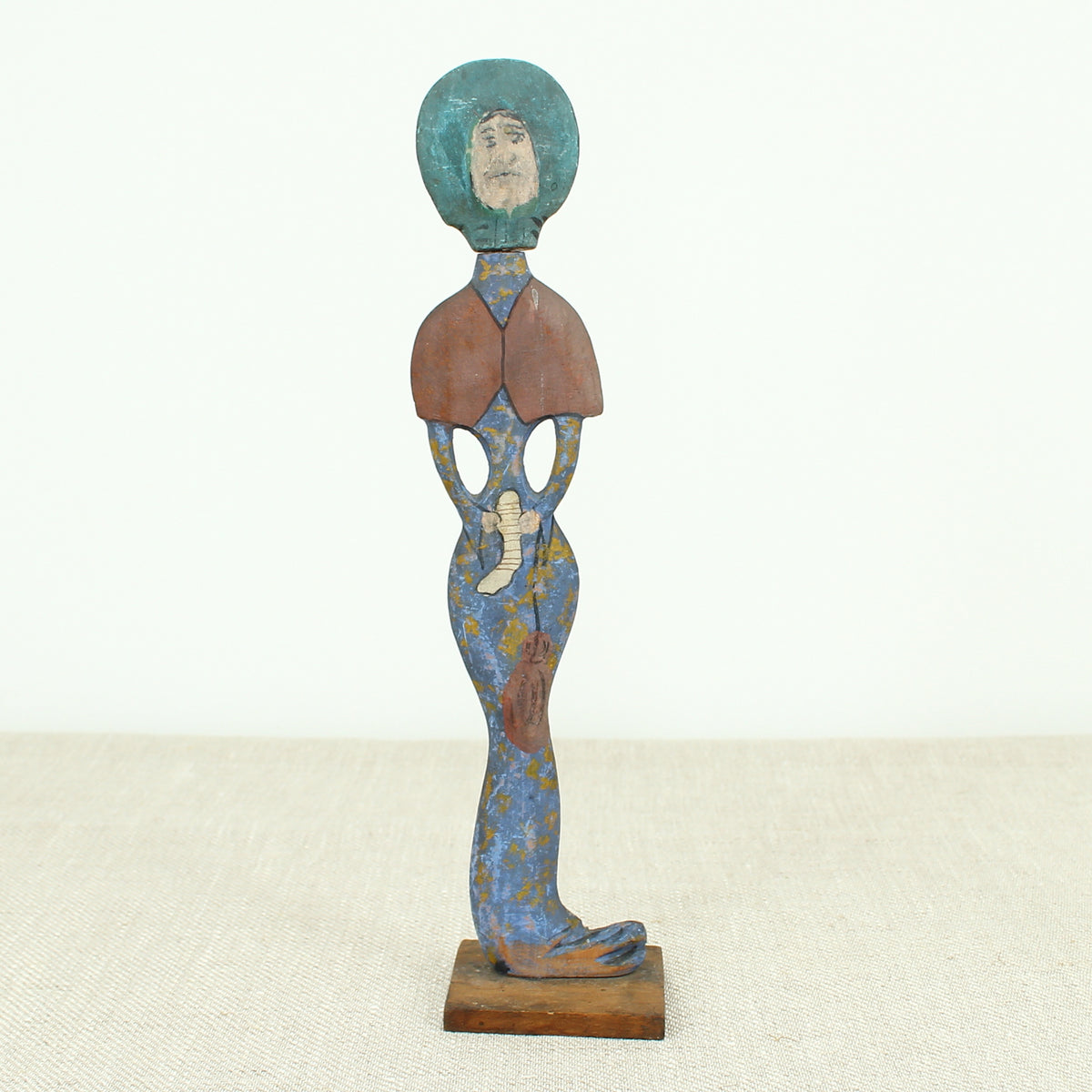 Treen, Folk Art - a pair of early 20th century painted wooden figures, of a well dressed gentleman and lady