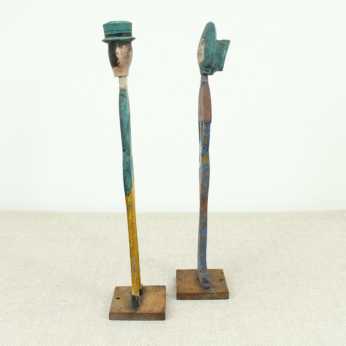 Treen, Folk Art - a pair of early 20th century painted wooden figures, of a well dressed gentleman and lady