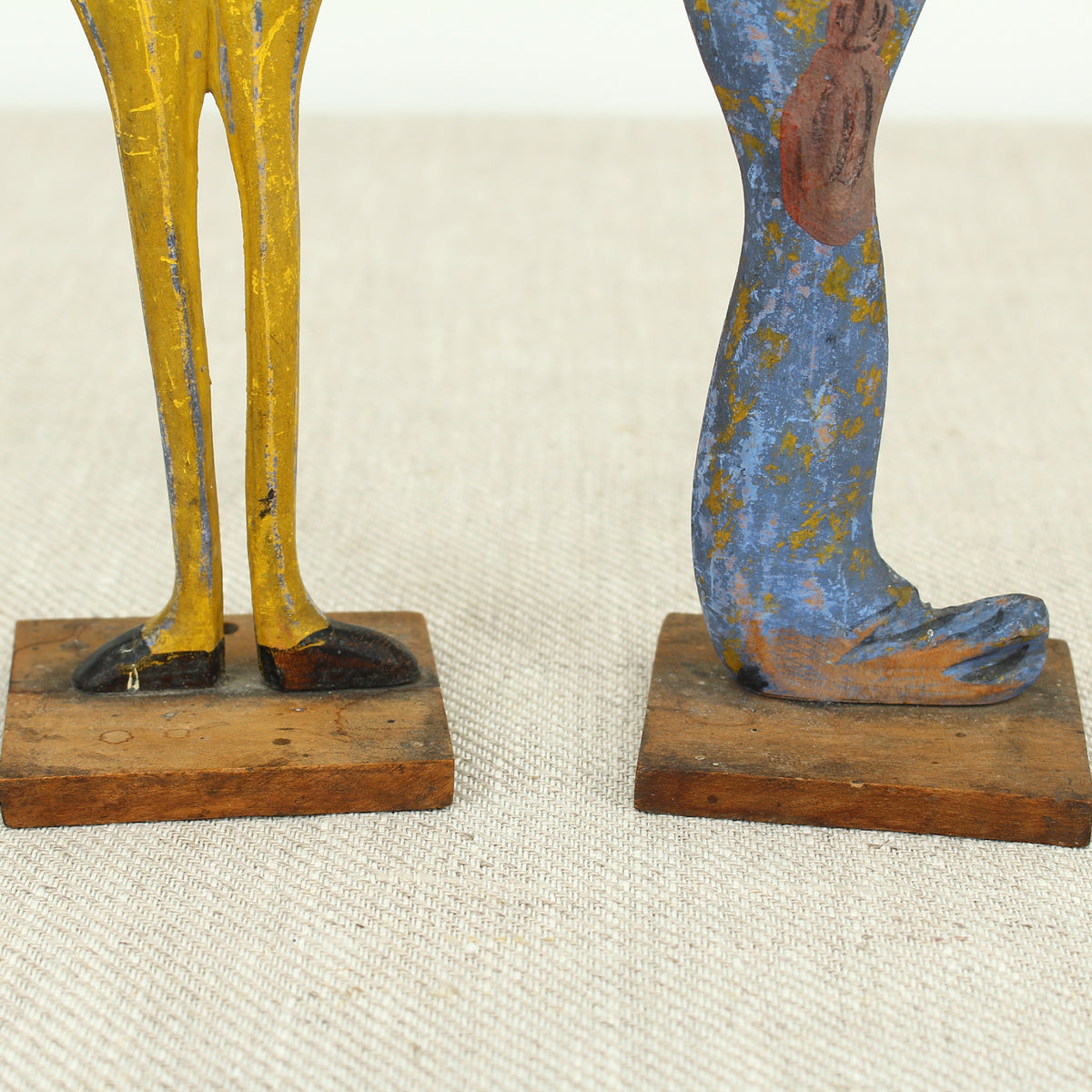 Treen, Folk Art - a pair of early 20th century painted wooden figures, of a well dressed gentleman and lady
