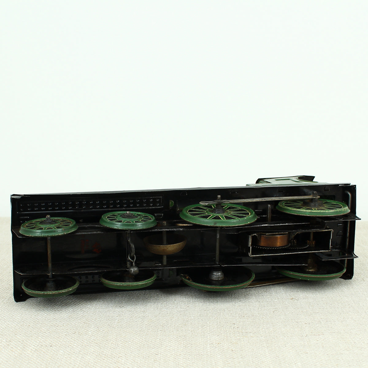 Toys & Juvenalia - a Gebrüder Bing (Germany) tinplate and clockwork 4-4-0 tank locomotive floor train, green livery, No.3410
