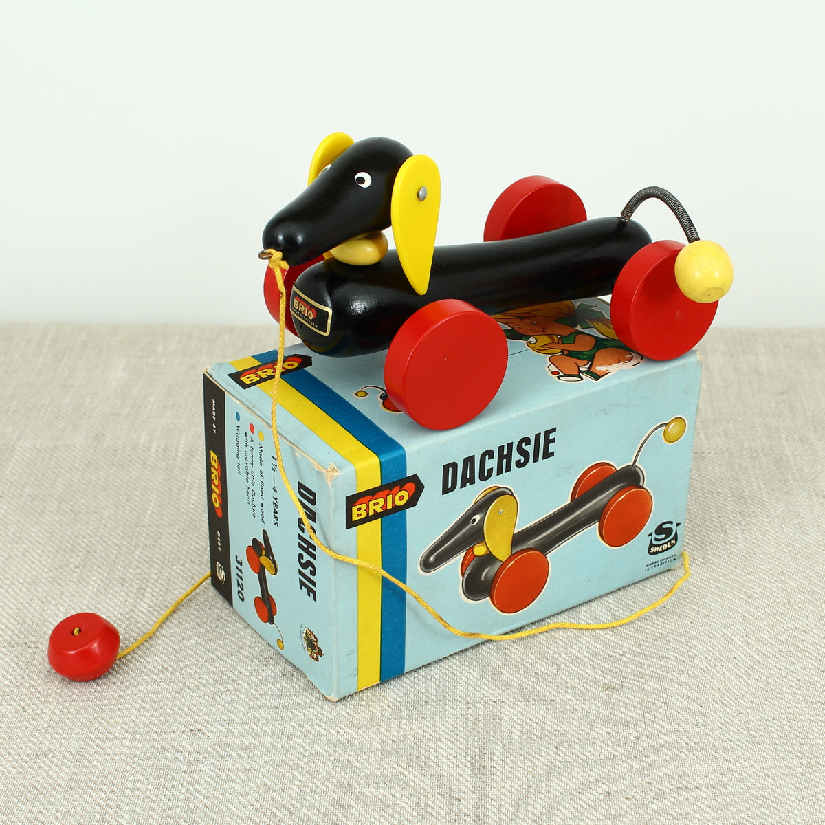 Toys & Juvenalia - a Brio (Sweden) novelty Dachsie (Dachsund/Sausage Dog) wooden pull-along toy, No.31120, boxed