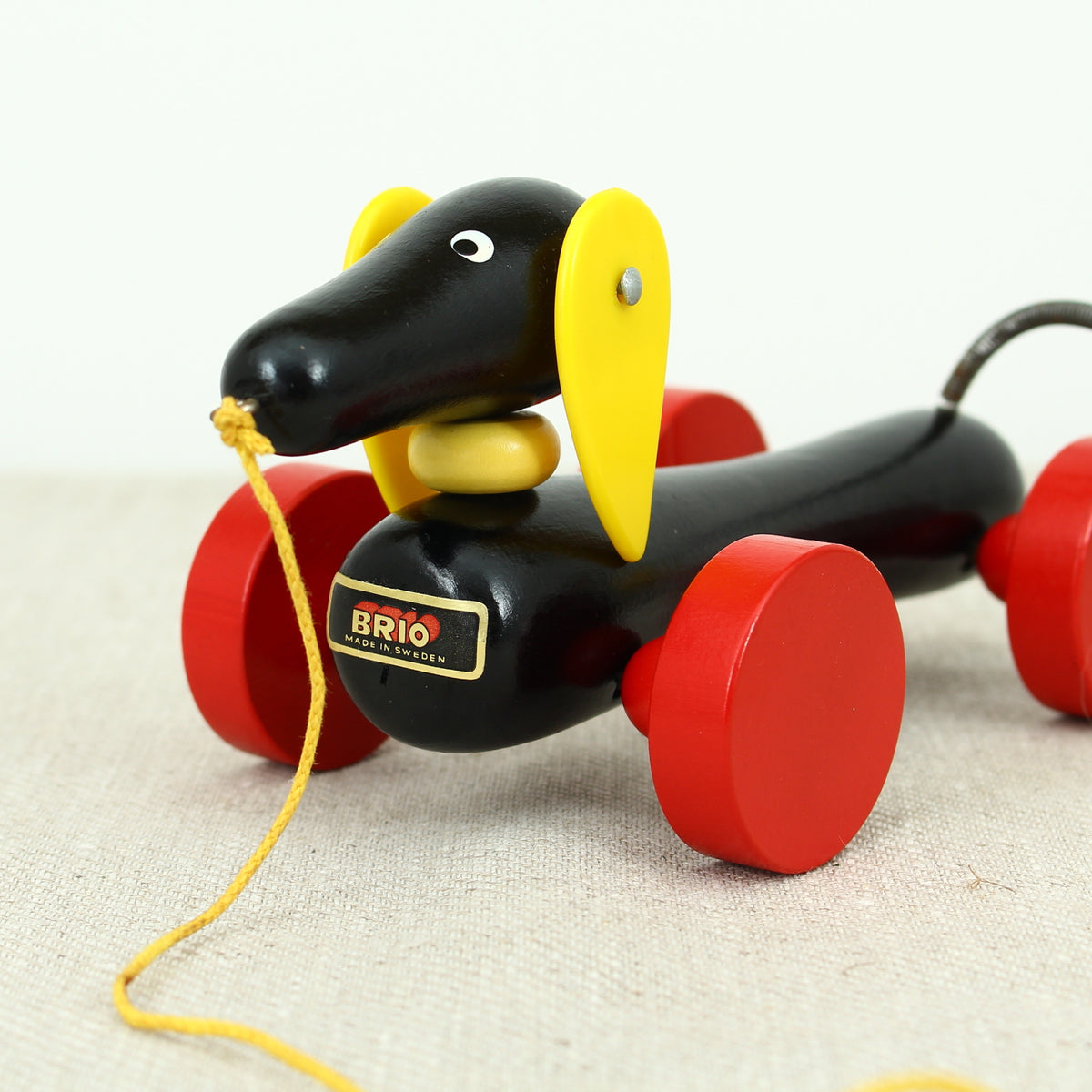 Toys & Juvenalia - a Brio (Sweden) novelty Dachsie (Dachsund/Sausage Dog) wooden pull-along toy, No.31120, boxed