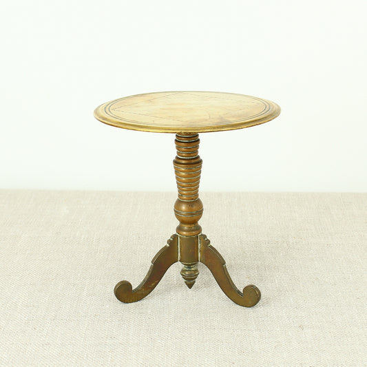 A 19th century Victorian miniature brass tilt top tripod table candle reflector