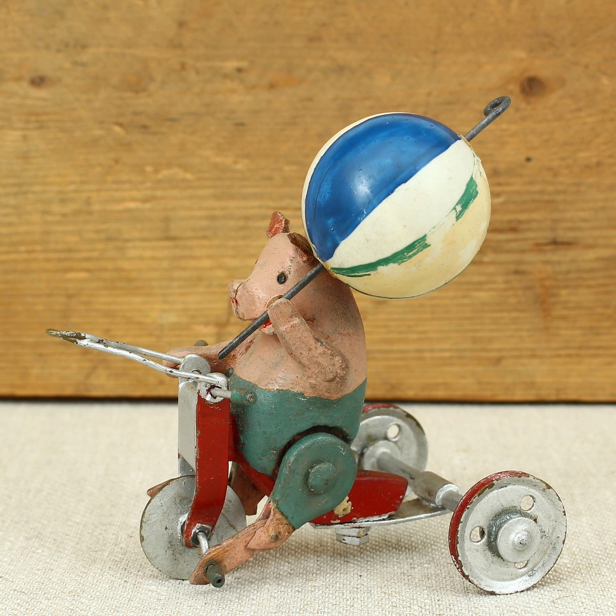 Toys & Juvenalia - a novelty scratch built Folk Art toy, Pig riding a tricycle