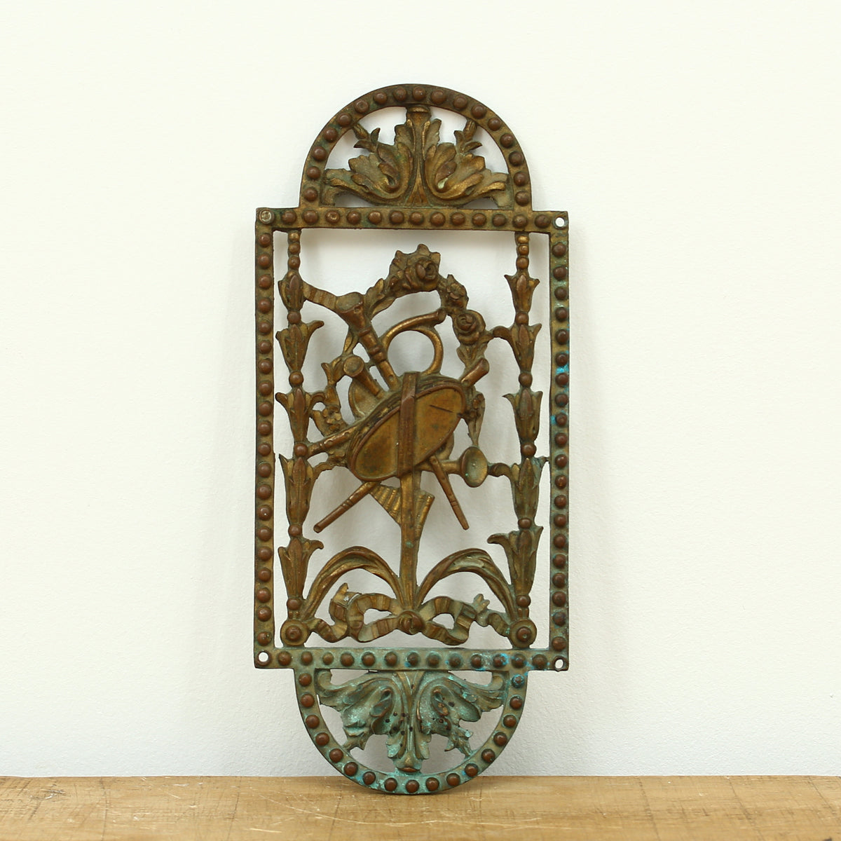 Reclamation & Salvage - a decorative brass finger plate, cast in relief