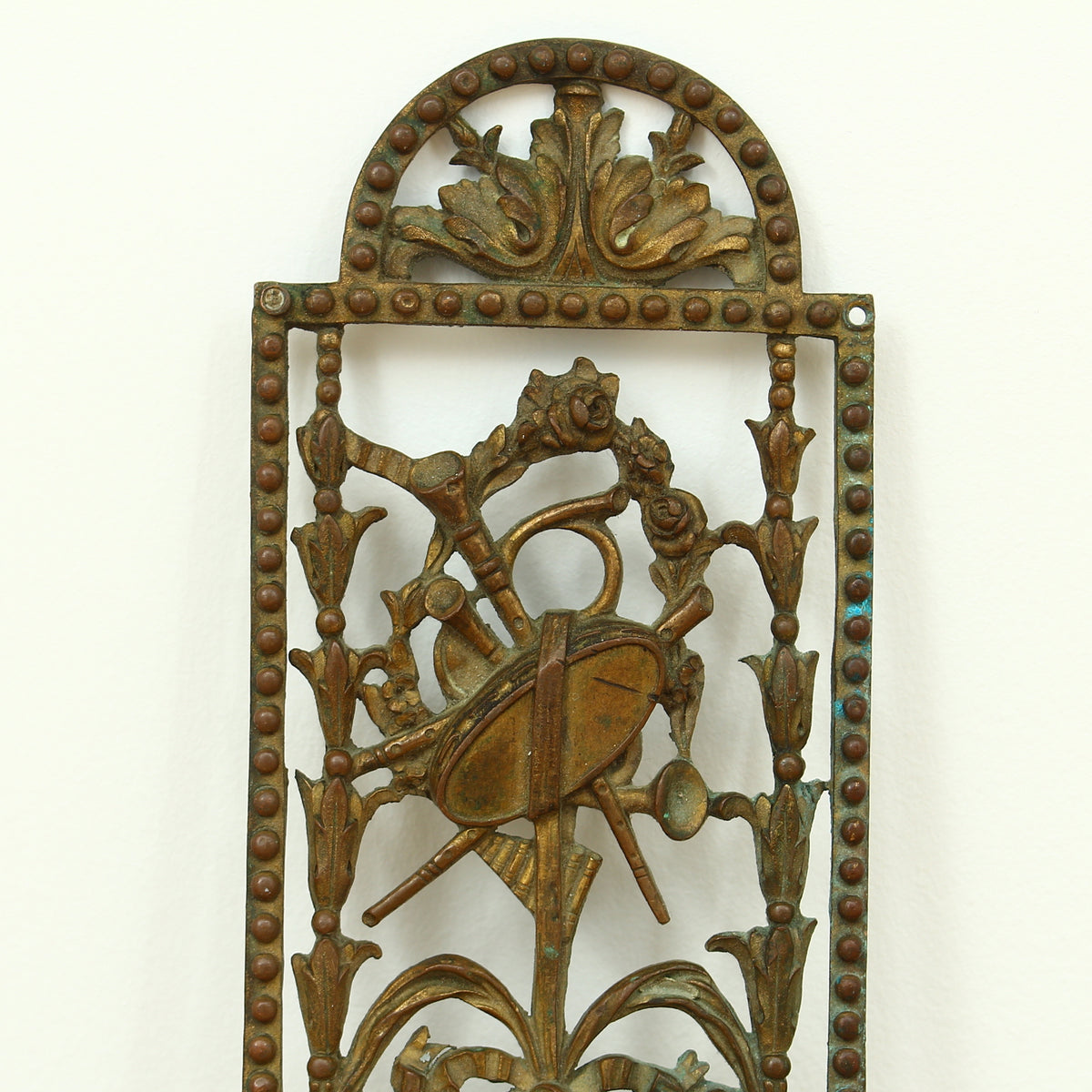 Reclamation & Salvage - a decorative brass finger plate, cast in relief