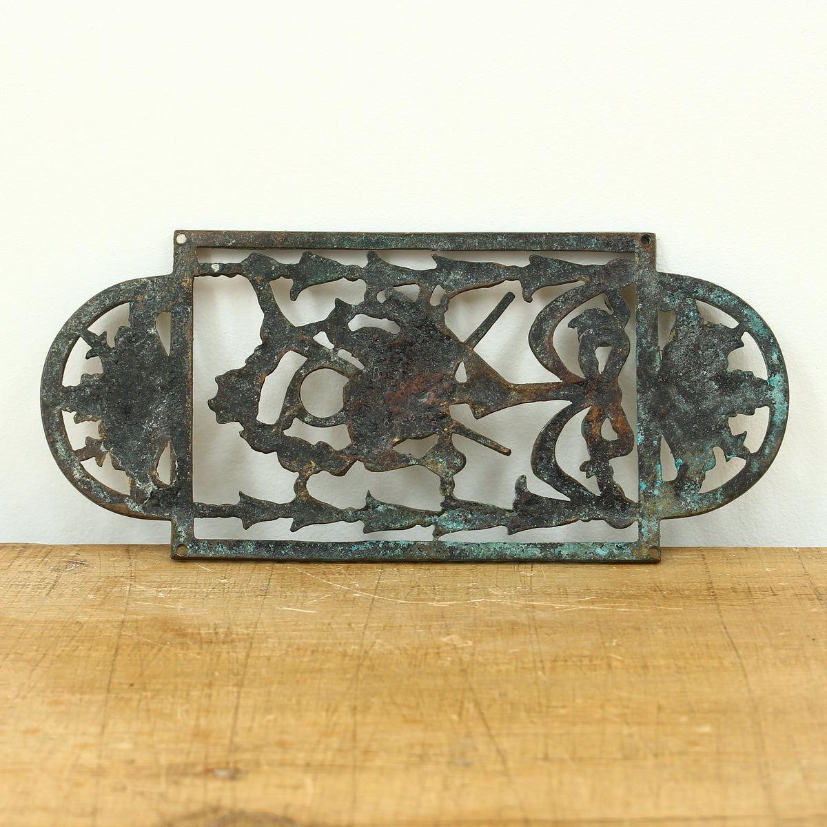 Reclamation & Salvage - a decorative brass finger plate, cast in relief