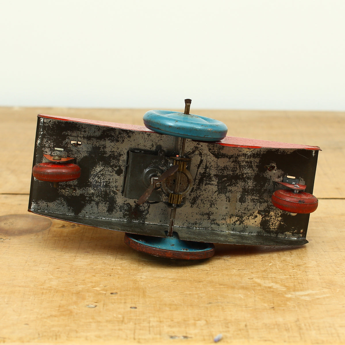 Toys & Juvenalia - a novelty tinplate and fixed clockwork mechanical toy, of a clown riding a Donkey