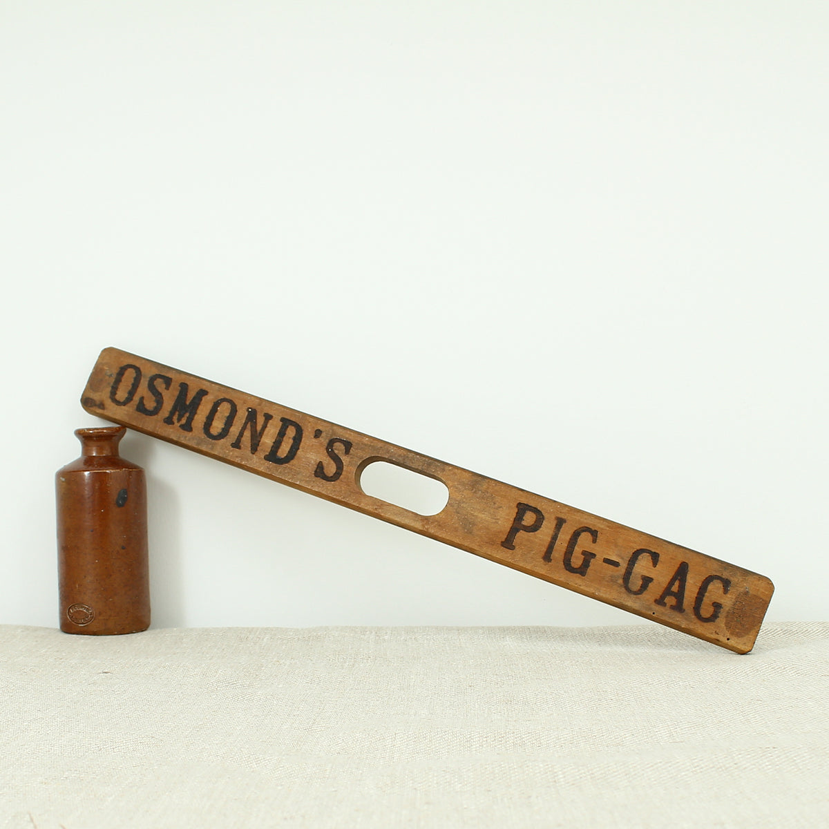 Treen, Veterinary Equipment - a wooden rounded rectangular shaped Pig gag stick for dosing