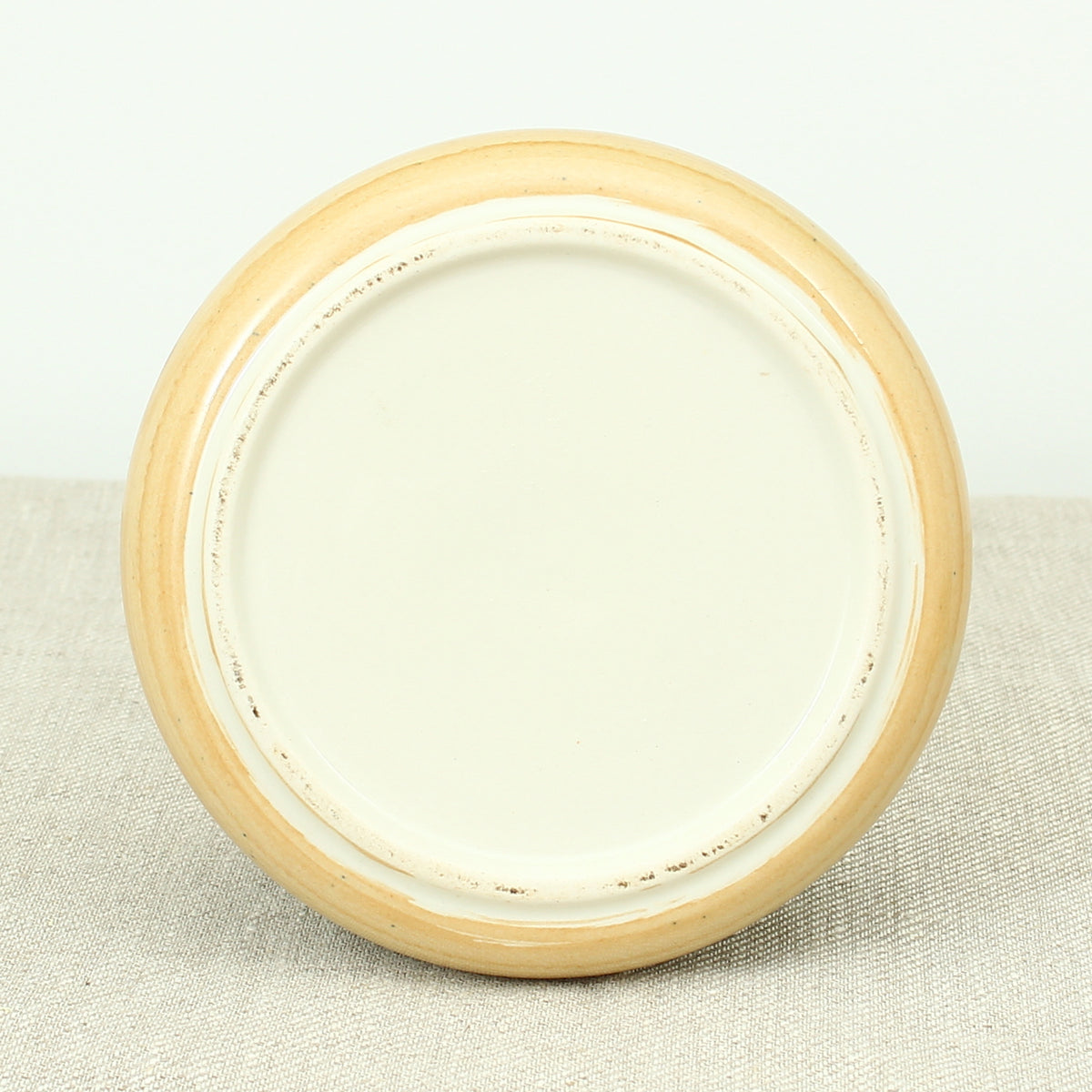 Advertising & Haberdashery Interest - a novelty ceramic jar, in the form of a faux oversized cotton reel, press close cover with printed design, 'DEWHURST'S SYLKO THREE SHELLS, MACHINE TWIST 40', finished in green, 15.5cm high