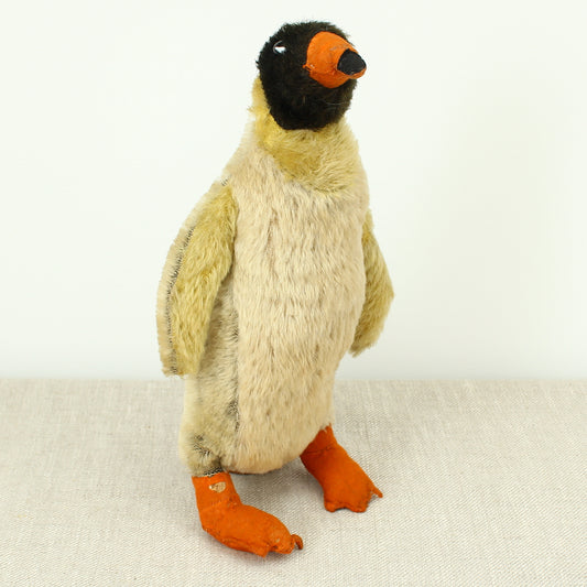 Toys & Juvenalia - a mid 20th century novelty mohair Penguin, black and white plastic eyes, orange and black felt beak, orange felt feet, 32cm high