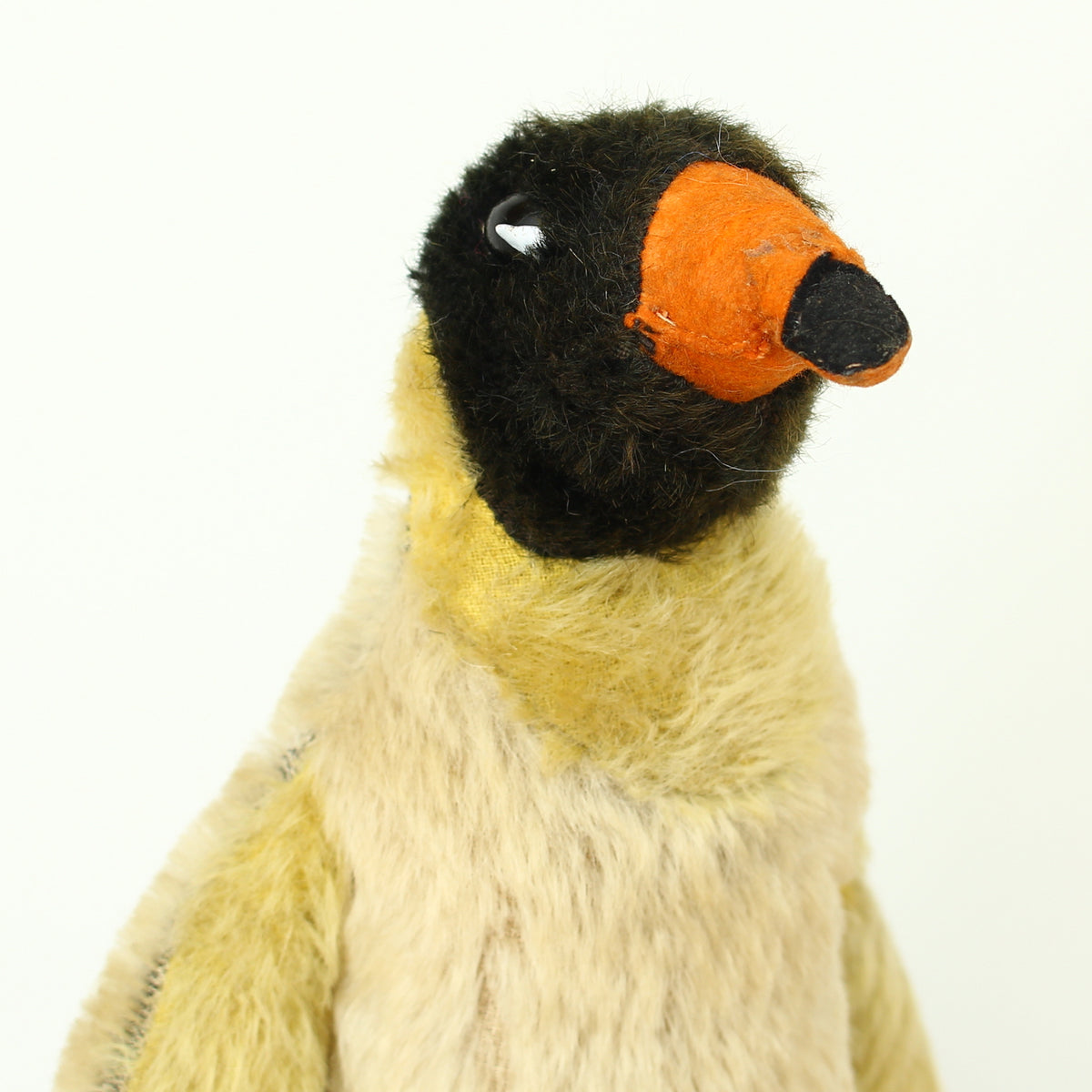 Toys & Juvenalia - a mid 20th century novelty mohair Penguin, black and white plastic eyes, orange and black felt beak, orange felt feet, 32cm high