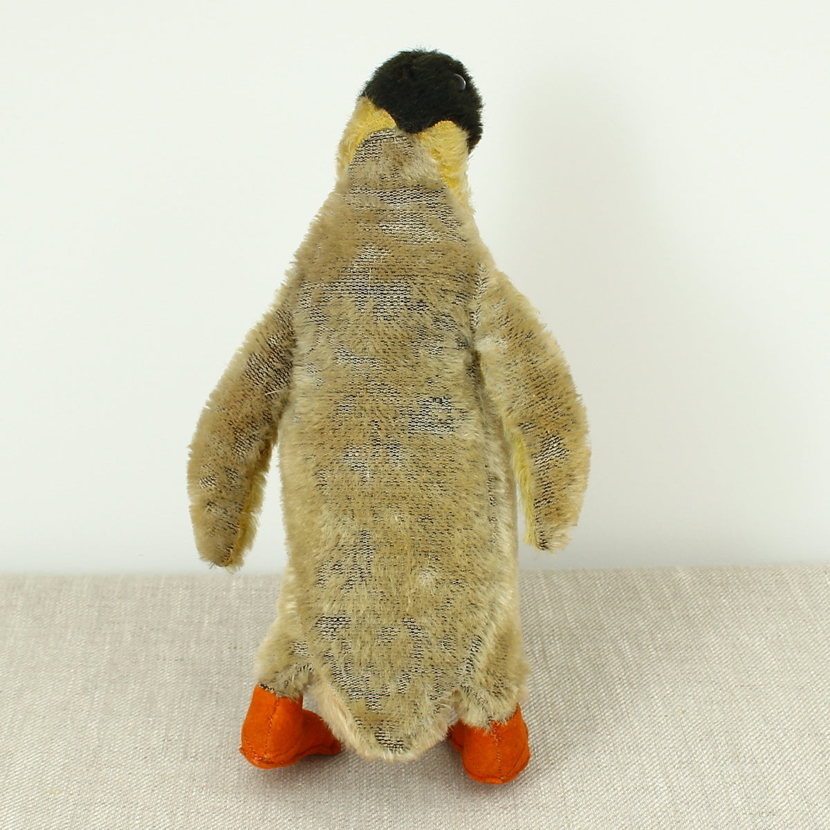 Toys & Juvenalia - a mid 20th century novelty mohair Penguin, black and white plastic eyes, orange and black felt beak, orange felt feet, 32cm high