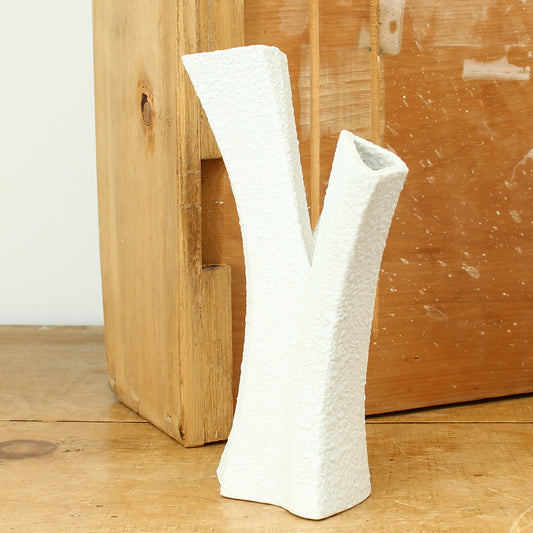 Post-War Modernist Design - a Sgrafo (Germany) Biomorphic design white porcelain vase, from the Korallenform series, designed by Peter Muller, textured body, 19.7cm high, printed and impressed mark to base, impressed '2018', 1960's period
