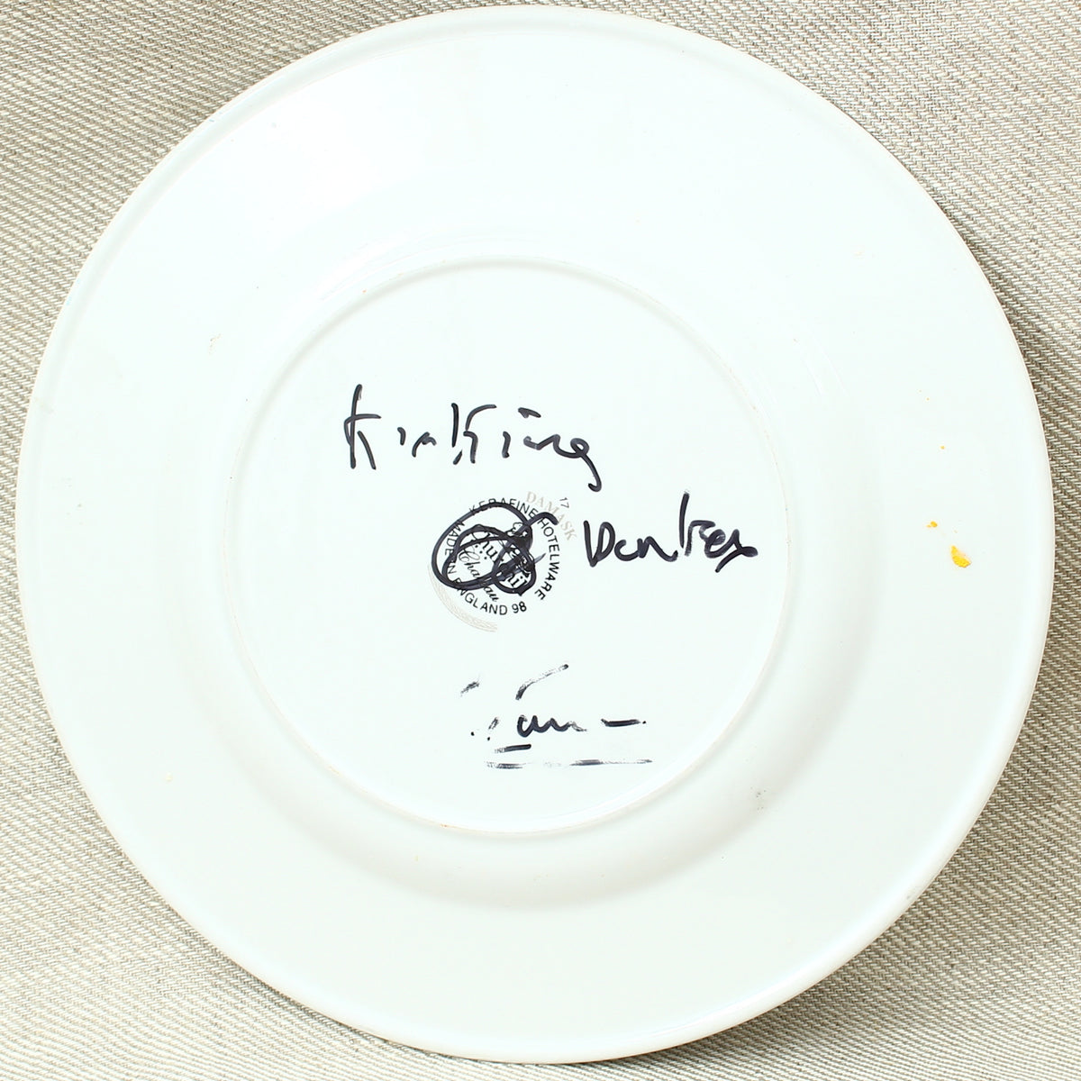 Simeon Stafford (British Artist, born 1956), Frolicking Donkey, oil on porcelain plate, signed, title to verso, 23cm diameter