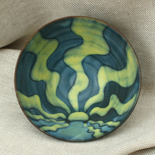 Tessa Fuch (British 1936-2012), matte glazed bowl, decorated with a sunrise design in blue and yellow tones, 16cm diameter, impressed initials to base
