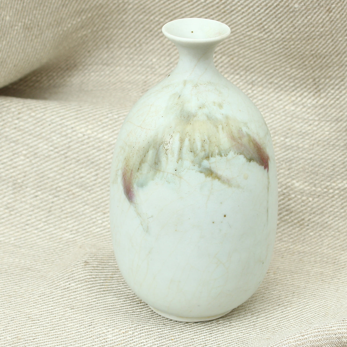 Tina Forrester (Studio Pottery) white porcelain tokkuri shape vase, decorated with green and burgundy glazed hues, 14.5cm high, painted mark to base
