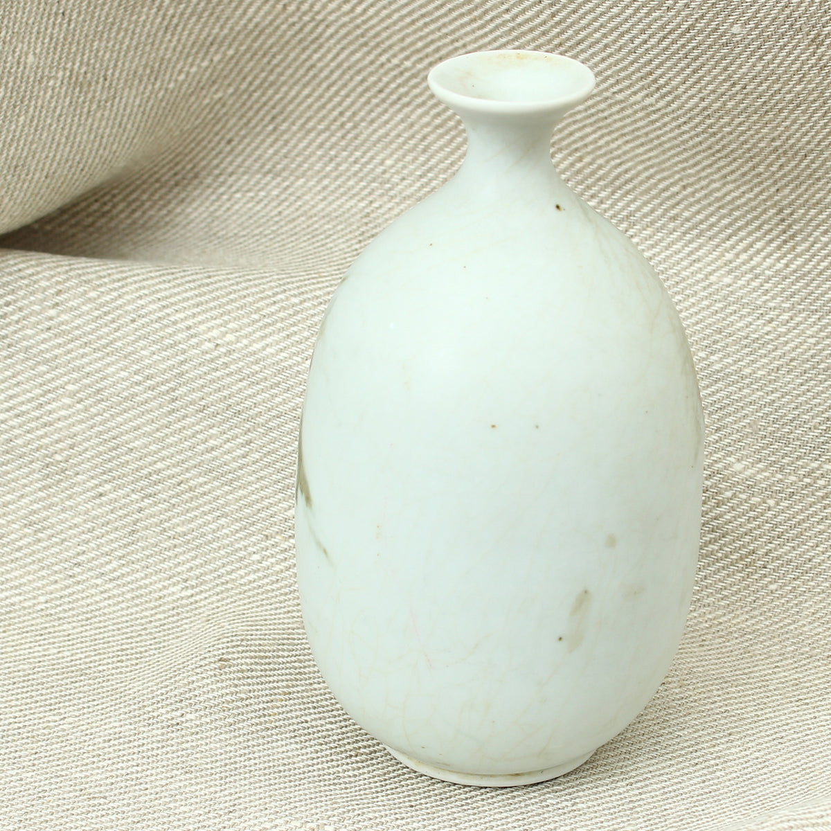 Tina Forrester (Studio Pottery) white porcelain tokkuri shape vase, decorated with green and burgundy glazed hues, 14.5cm high, painted mark to base