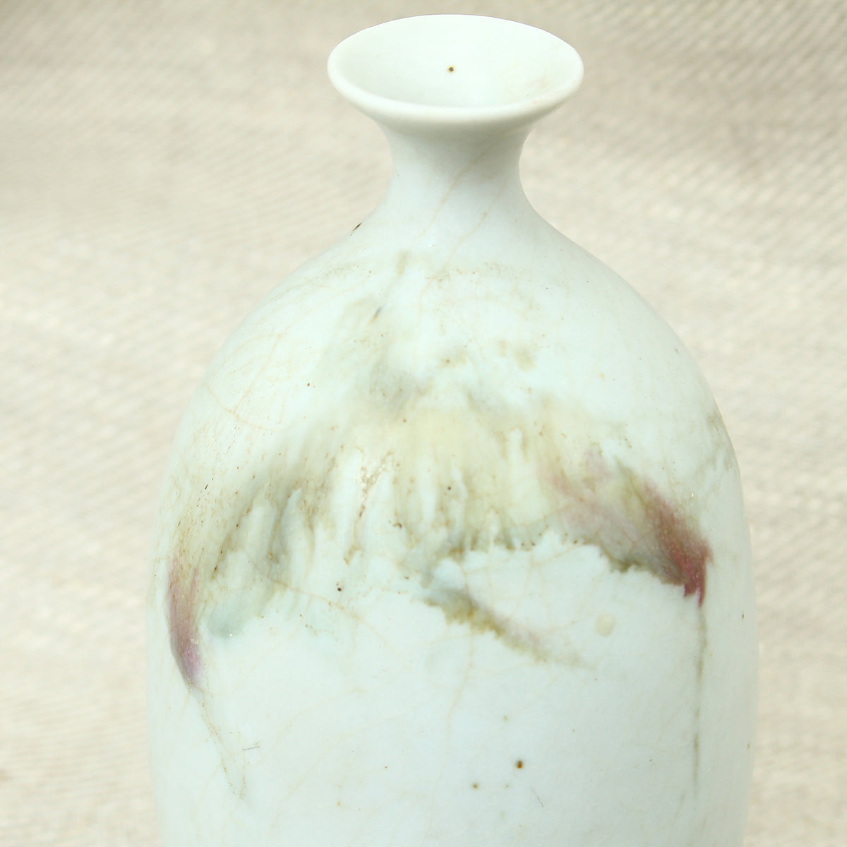 Tina Forrester (Studio Pottery) white porcelain tokkuri shape vase, decorated with green and burgundy glazed hues, 14.5cm high, painted mark to base