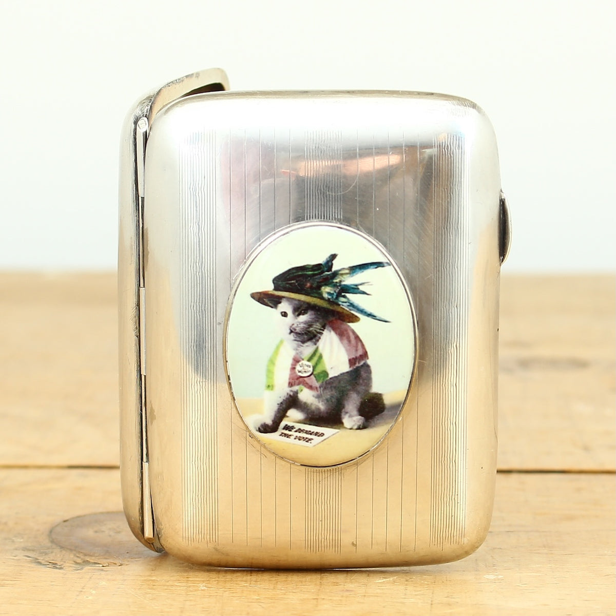 Social History, Suffragette Interest - an early 20th century George V silver rounded rectangular cigarette case