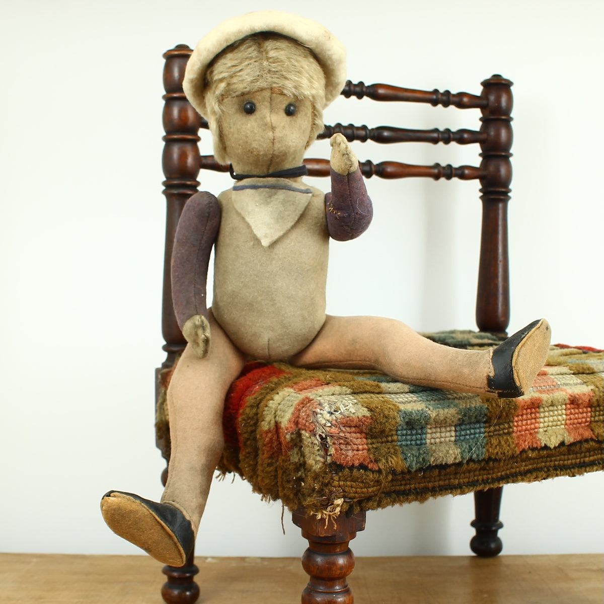 Toys & Juvenalia - an early 20th century straw-filled felt and mohair sailor doll, in the Steiff style