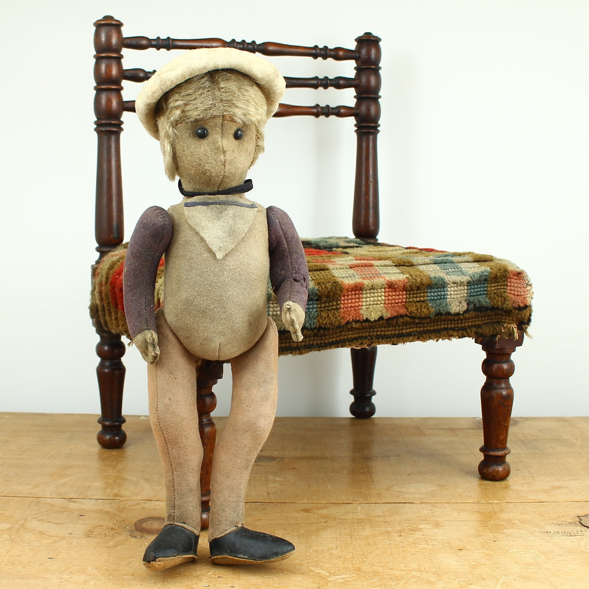 Toys & Juvenalia - an early 20th century straw-filled felt and mohair sailor doll, in the Steiff style