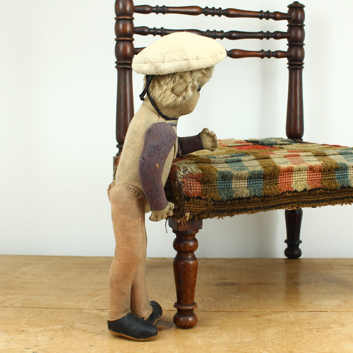 Toys & Juvenalia - an early 20th century straw-filled felt and mohair sailor doll, in the Steiff style