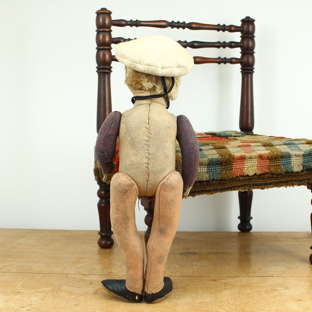 Toys & Juvenalia - an early 20th century straw-filled felt and mohair sailor doll, in the Steiff style