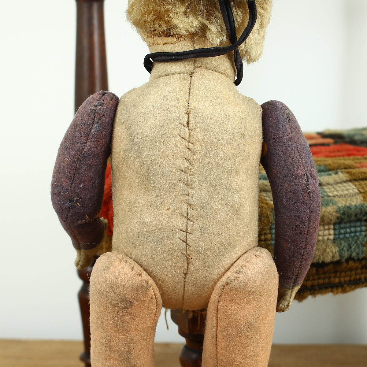 Toys & Juvenalia - an early 20th century straw-filled felt and mohair sailor doll, in the Steiff style