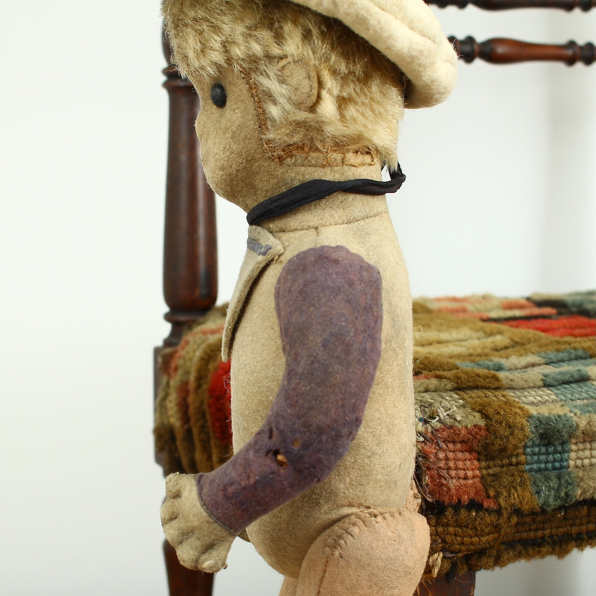 Toys & Juvenalia - an early 20th century straw-filled felt and mohair sailor doll, in the Steiff style