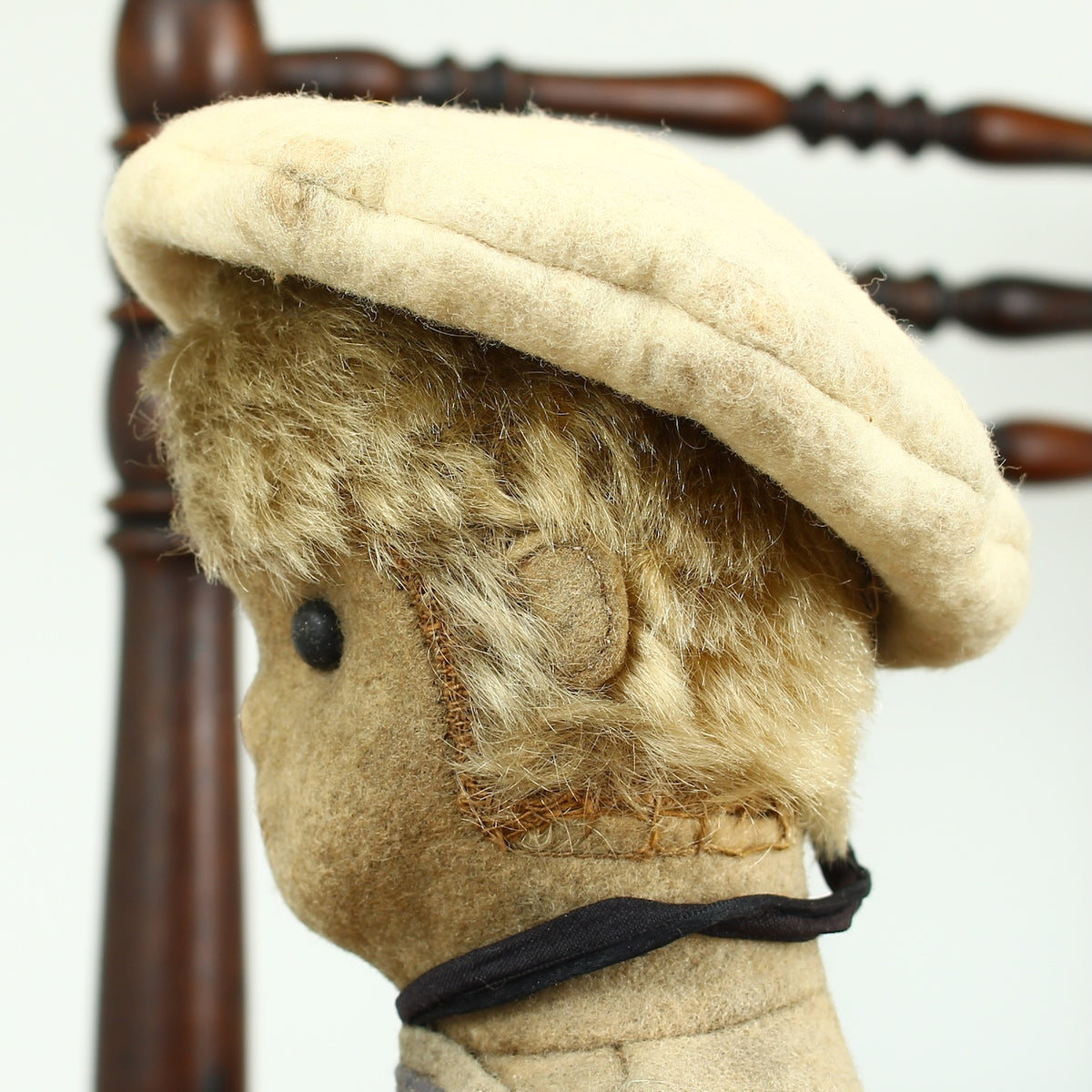 Toys & Juvenalia - an early 20th century straw-filled felt and mohair sailor doll, in the Steiff style
